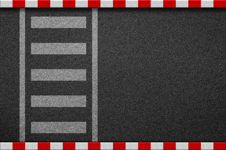Empty crosswalk on asphalt road with red and white sign on sidewalk curb top viewの写真素材