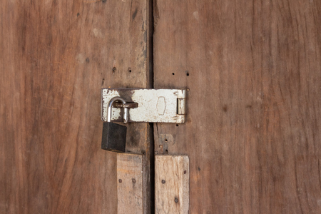 Old wood door lockの写真素材