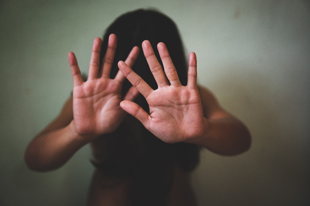 Women bondage lift hands against violence against women, international women's day.のeditorial素材