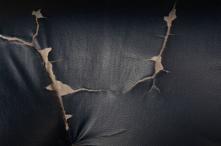 Sofa surface ,Old leather cushion black texture backgroundの写真素材