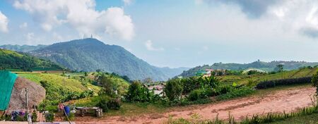 Panorama high view beautiful nature landscape of the mountain sky and forest in the morning on the hilltop viewpoint at Phu Thap Berk attractions of Phetchabun Province Thailandの写真素材