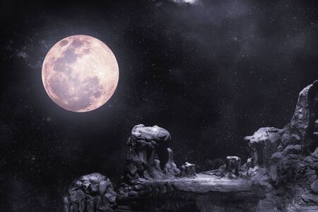 During the night time, the rocky mountains had full moon and stars.