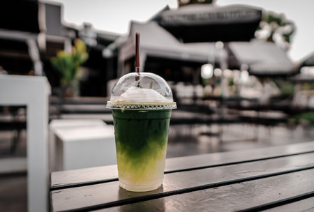Coconut black coffee on table outdoor in cafe.の写真素材