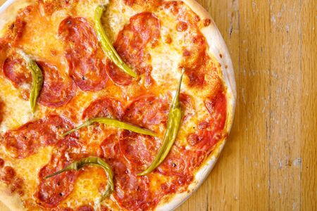 Pizza on a restaurant tableの写真素材