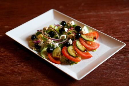 Salad on a restaurant tableの写真素材