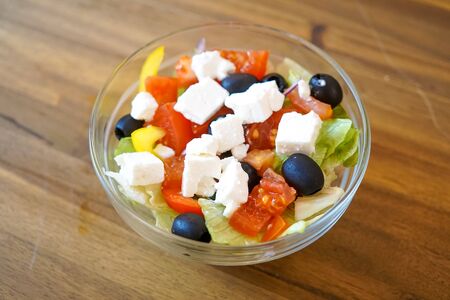 Salad on a restaurant tableの写真素材