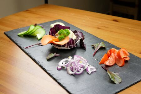 Salad on a restaurant tableの写真素材