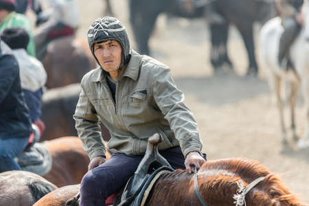 Uzbekistan, Parkent-08/03/2019: Ulak-Kupkari (Buzkashi, Kok-Boru) -traditional horse riding...