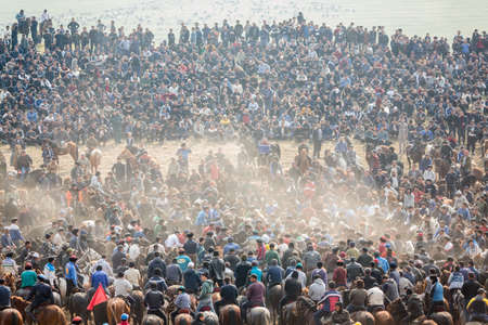 Uzbekistan, Parkent-08/03/2019: Ulak-Kupkari (Buzkashi, Kok-Boru) -traditional horse riding competition in Uzbekistanのeditorial素材