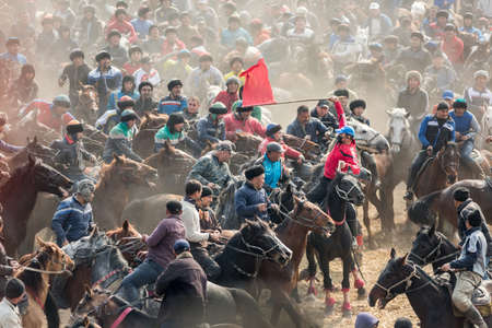 Uzbekistan, Parkent-08/03/2019: Ulak-Kupkari (Buzkashi, Kok-Boru) -traditional horse riding competition in Uzbekistanのeditorial素材