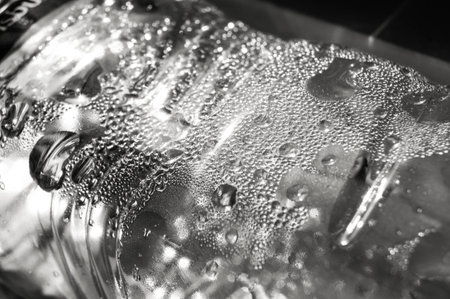 Condensation of water on the inner surface of a plastic bottle