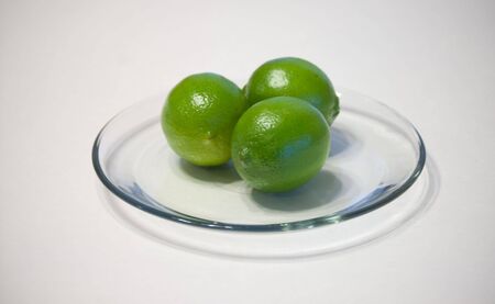 limes on a plateの写真素材