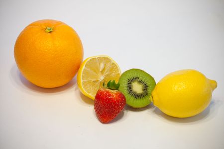 Tropical Fruit and a strawberryの写真素材