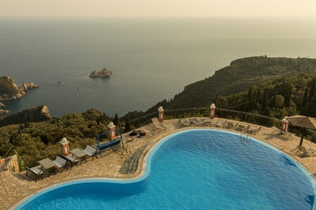 Swimming pool and terrace on the top of the mountain in Corfu Island, Ionian Sea, Greeceのeditorial素材