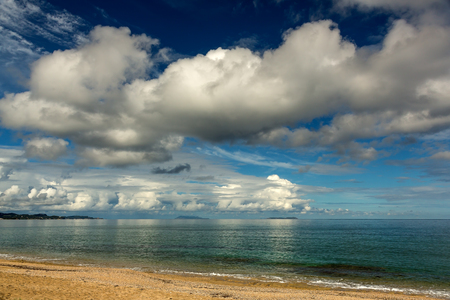 Blue seascape under clouds skyの写真素材