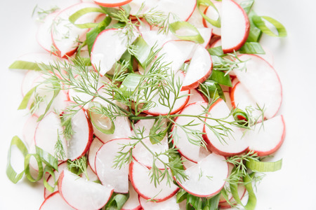 Radish salad with dill and green onionsの写真素材