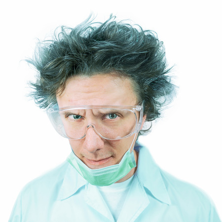 Portrait of a crazy man doctor in a white backgroundの写真素材