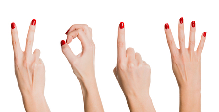 New year with female hands forming number 2014 on white の写真素材