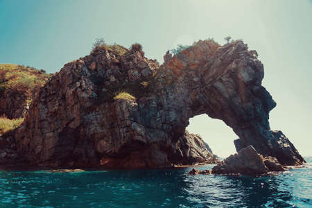 Rock â€œDragonâ€ in the sea, Primorsky region, Russia