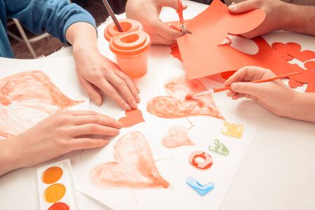 Family makes decorations for holidayの写真素材
