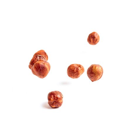 Drop nuts on a white backgroundの写真素材