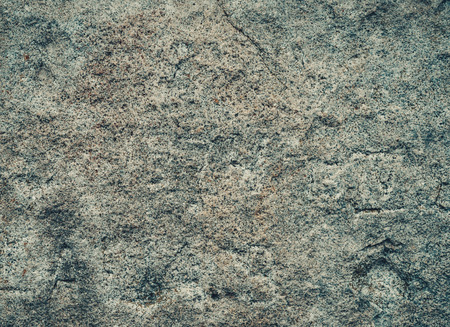 Rough surface stone of gray color, texture for background