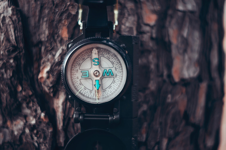 Compass on background of wood, close-up imageの写真素材