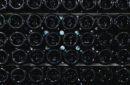Bottoms of wine bottles dark color. Texture or background