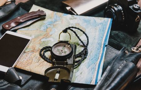 Equipment for tourism and travel. Map and compass.の写真素材