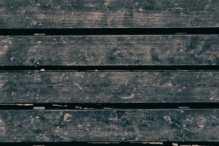 Old dark wooden planks board background and texture.の写真素材