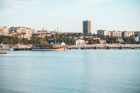 Gelendzhik, Russia, 27 May 2020: Resort city and central pier with standing pleasure ships and yachts in Black sea bay in summer day.のeditorial素材