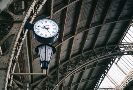 Architectural elements, vintage lantern and clock close-up.のeditorial素材