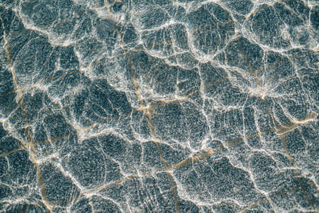Refection of Blue water in Swimming poolの写真素材