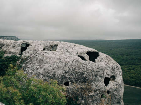 Detail of ancient cave town high in a rock.の写真素材