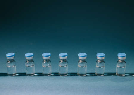 Row of medical ampoules for vaccination or treatment.の写真素材