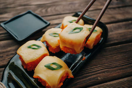 Hot rolls set with tobiko caviar and cheese.の写真素材