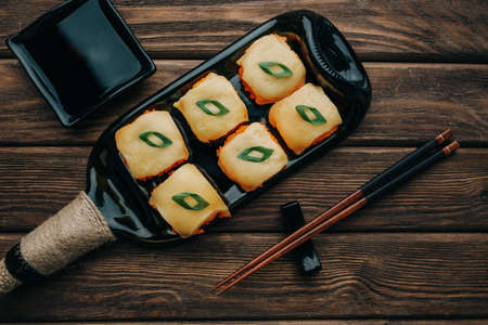 Sushi rolls set with tobiko caviar and cheese, top view.の写真素材