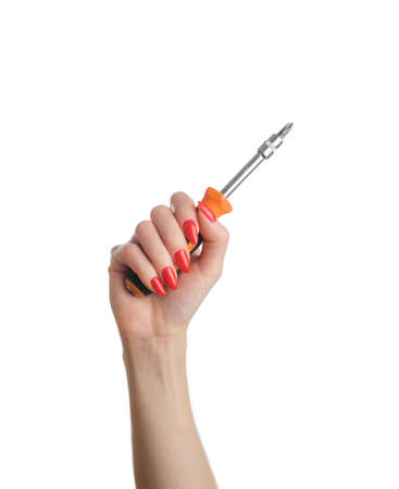 Female hand with a screwdriver in hand.の写真素材