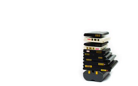 cell phone batteries. stacked. battery recycling. recovery of copper, gold, lithiumの写真素材