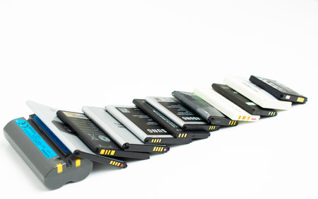 cell phone batteries. stacked. battery recycling. recovery of copper, gold, lithiumのeditorial素材