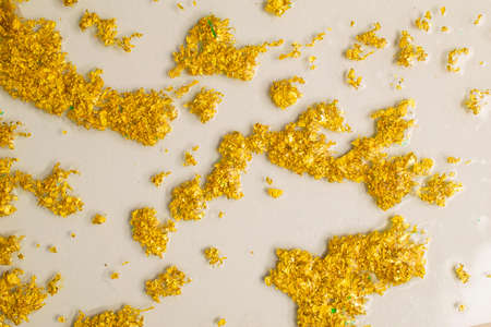 gold recovery. etched gold flakes on the wallpaper.の写真素材