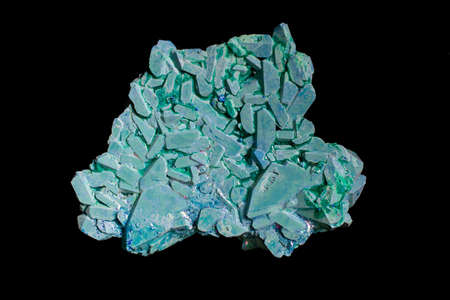 copper ammonium carbonate. blue crystals on a black background. macro.