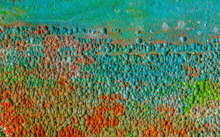 Natural multicolored background with patina rusty copper plate. lunar, martian landscape.の写真素材