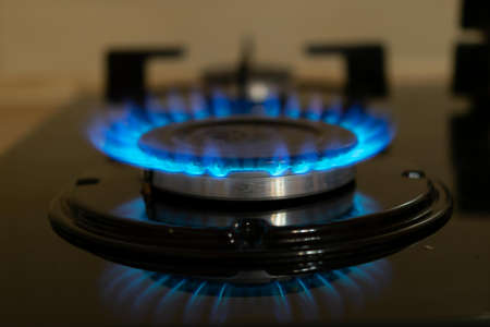 stove gas burner. blue flame.の写真素材