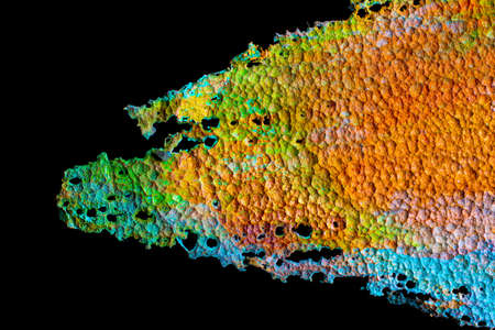 Oxidized copper, abstraction. Natural orange, blue. green yellow background with patina rusty copper plateの写真素材