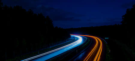 Night road lights. Lights of moving cars at night. long exposureの写真素材