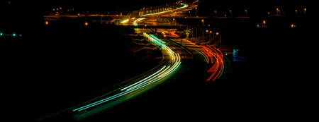 night highway, long exposure of cars lights on the night road