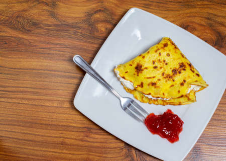 pancake with jam on a plate for breakfast