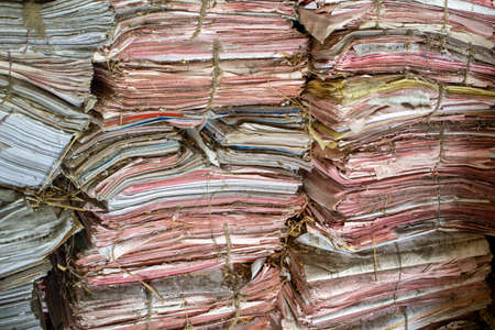 stack of old invoice documents in the archive