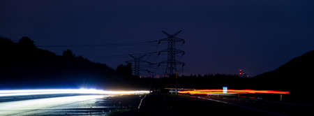 Night road lights. Lights of moving cars at night. long exposure red, blue, orange, multicolored